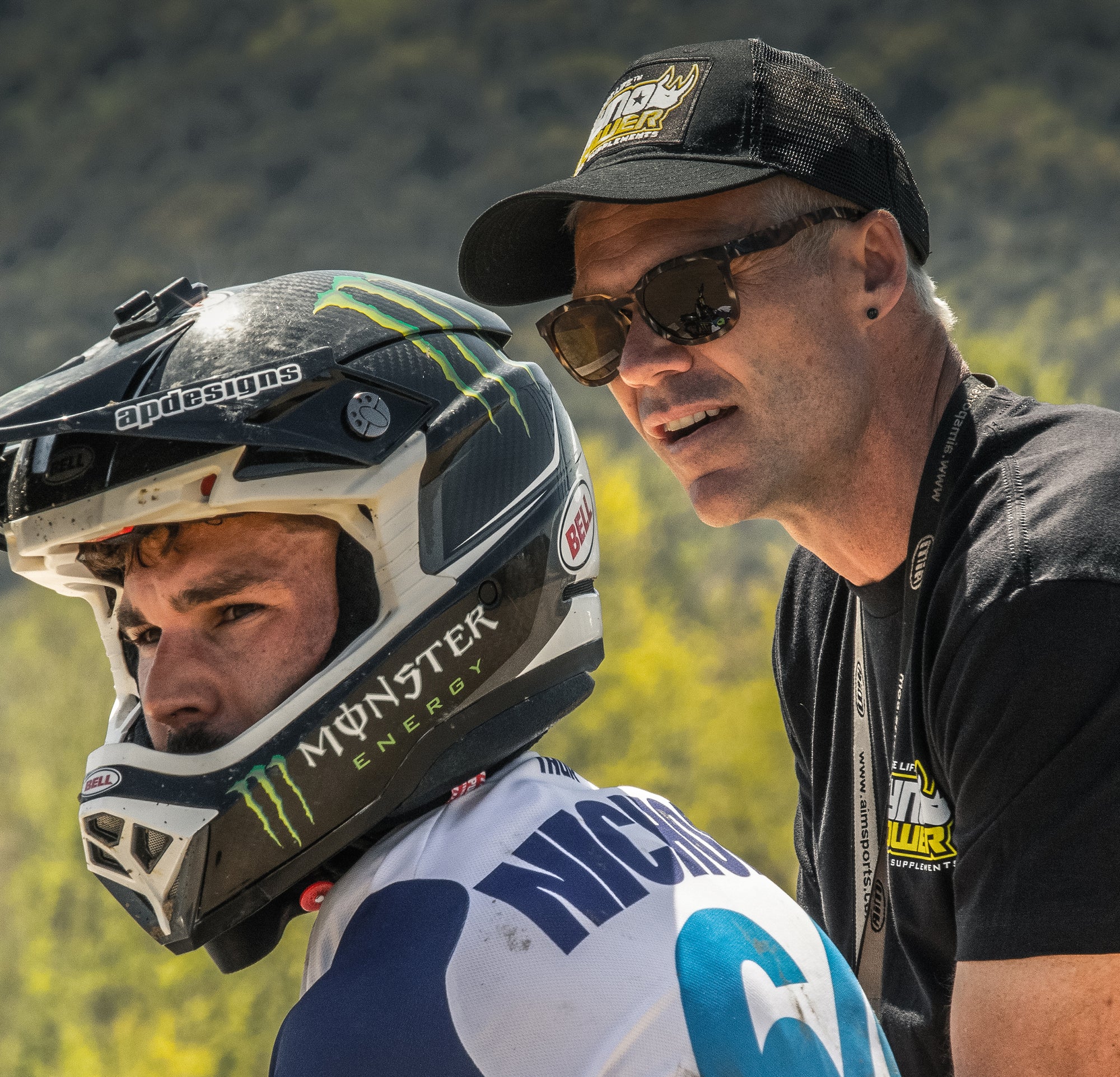 Motocross trainer talking to athlete